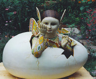 A restored monumental Sergio Bustamante sculpture. Universal Fine Art Conservation restored the broken butterfly wings that were attached 
to the head of the girl emerging from an egg.